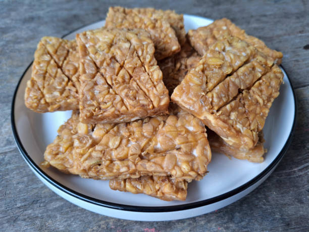 istock Delicious Tempe Goreng Or Fried Tempeh On A Plate. Food Menu. 2203422419