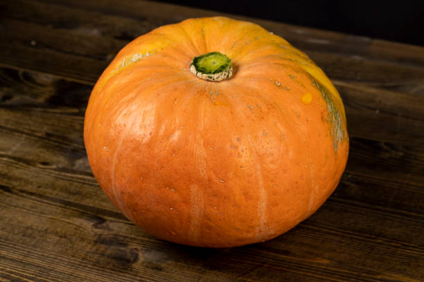 istock orange pumpkin with sweet flesh 2203422621