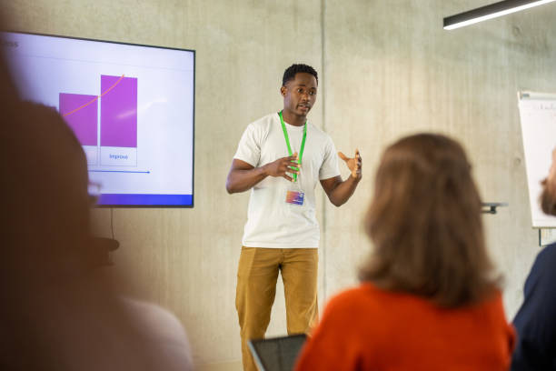 istock African professional presenting AI process during business conference 2203423686