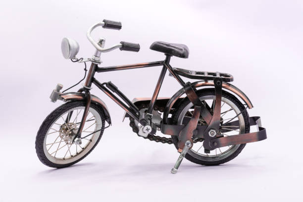 istock Bicycle handicraft a meticulously crafted black and copper metal bicycle model. 2203423761