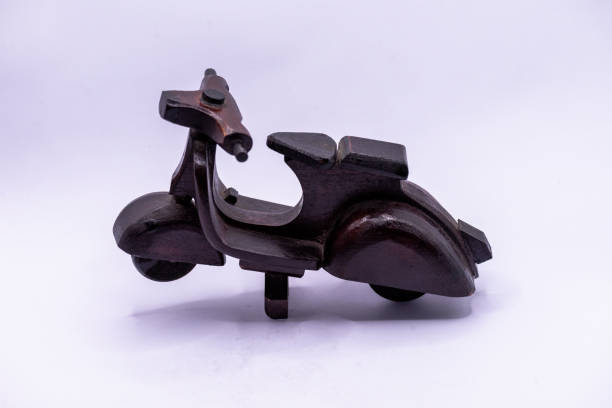 istock mini handicraft automatic scooter made of wood 2203423797