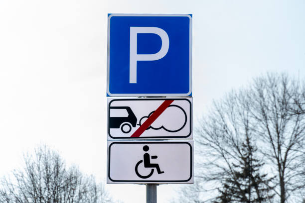 istock A public parking sign displays rules for parking vehicles and accessibility provisions for disabled individuals in a clear and straightforward manner 2203428669