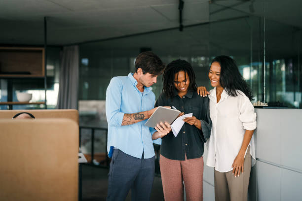 istock A diverse, talented team collaborates effectively in a bright office space during a business meeting 2203433766