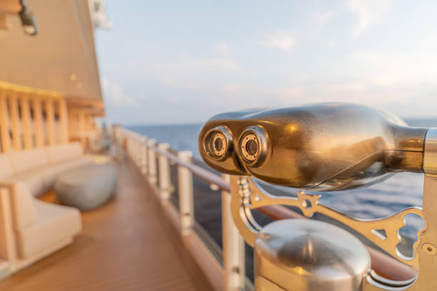 Telescope with the view on Lake Constance, Austrian and Swiss Coast. Photo taken in Lindau, Germany.