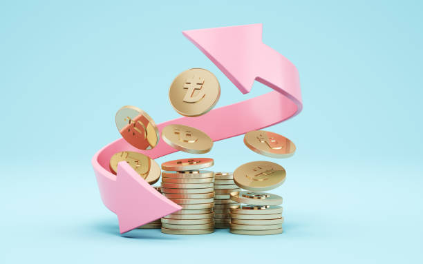 istock Turkish Lira Gold Coins with Pink Arrow on Blue Soft Infinity Background 2203438260