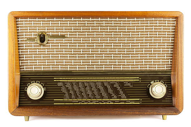 Yellow old radio on white background