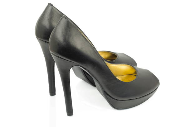Women's shoes in black color on white background