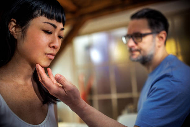 istock man comforting his girlfriend at home while she is looking upset 2203441333