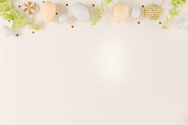 istock Easter themed arrangement of decorative eggs and branch greenery on a neutral background. 3d rendering 2203445109