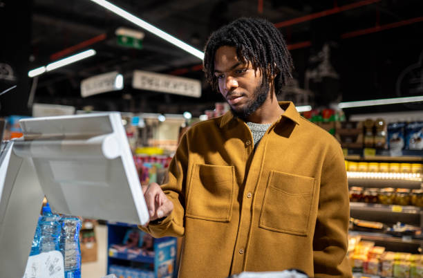 istock Choosing Items In a Supermarket 2203445617