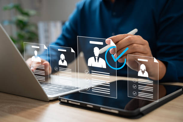 istock Human resources manager using stylus choose the right candidate recruitment process,Hiring,Team building strategy,Corporate recruitment process with CRM tools and Digital innovation in human resources 2203446986