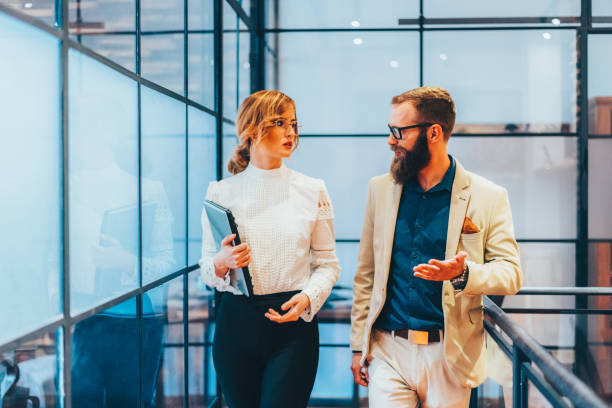 istock Business people in the office discussing work 2203449210
