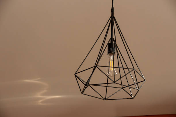 istock Modern Geometric Style Light Fixture with Exposed Bulb Design 2203449918