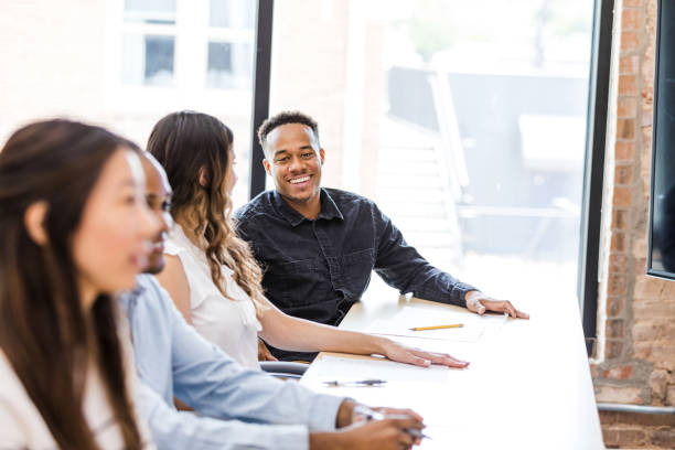 istock Multiracial Group Meeting: Diverse Team Collaboration and Discussion 2203450045