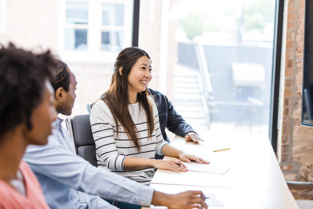 istock Multiracial Group of People in a Meeting 2203450054