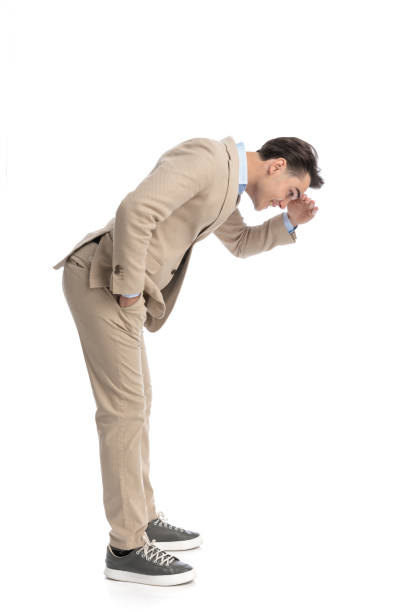 istock smart casual man waiting in line is leaning forward 2203452848