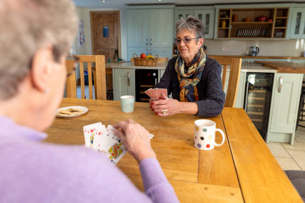 istock Focusing on Strategy in a Game of Cards 2203454718