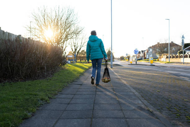 istock Carrying Groceries Home 2203454901