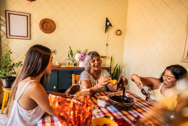 istock Family making chocolate eggs during the Easter holiday at home 2203456306