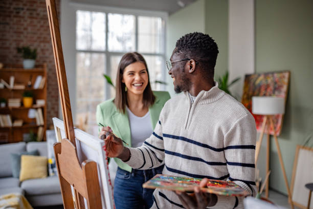 istock Young artists collaborate and learn in a lively art studio environment filled with creativity and inspiration 2203456898
