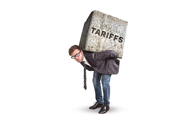 istock Person struggling due to tariffs isolated on white 2203459551