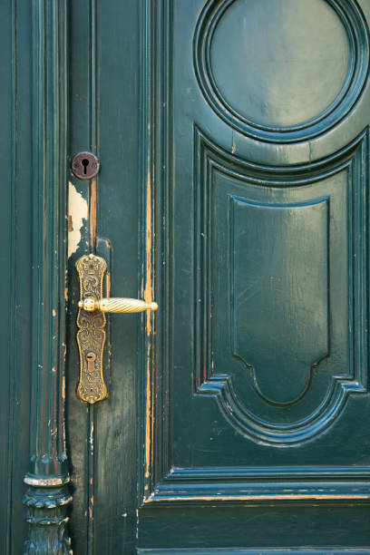 istock green old door close up outdoor 2203461421