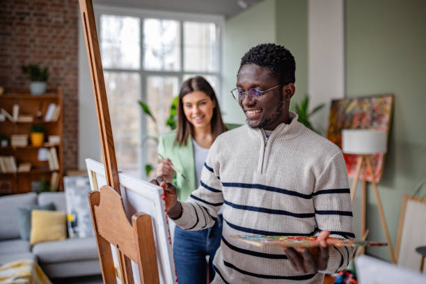 istock Young artists explore their creativity in a vibrant art studio during a collaborative workshop session 2203462156