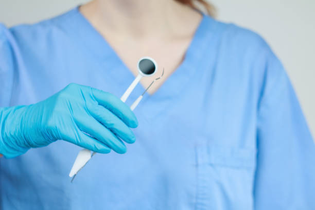 istock The dentist conducts diagnostics and training using instruments and an artificial jaw for practice. 2203464897