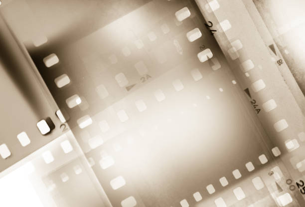 istock Film negatives brown background 2203467758