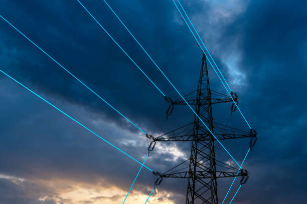 istock Electricity Pylon with Power Lines at Dusk 2203470926