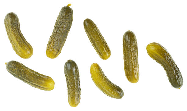 istock Collection of marinated pickled cucumbers isolated on a white background, view from above. 2203472791