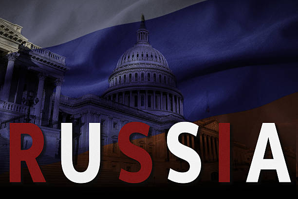 Concept with a Russian flag overlaying Congress exploring the move of the US to support and work with Russia.  USA spelled in Russia