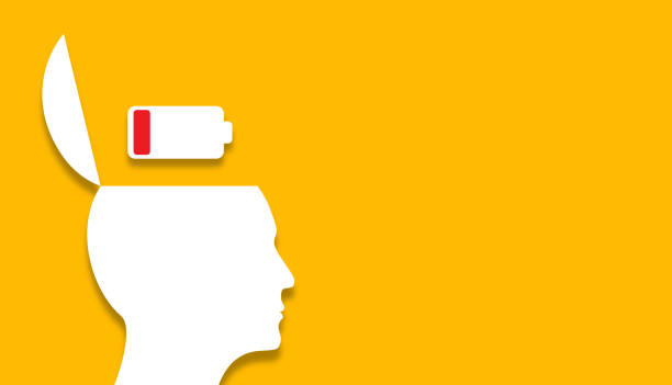 istock Human head with low battery icon on yellow background. Mental health and problems with memory. 2203476946