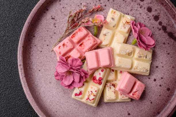 istock Multicolored handmade chocolate bars pink, white, brown colors 2203478366