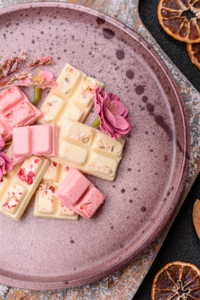 istock Multicolored handmade chocolate bars pink, white, brown colors 2203478595