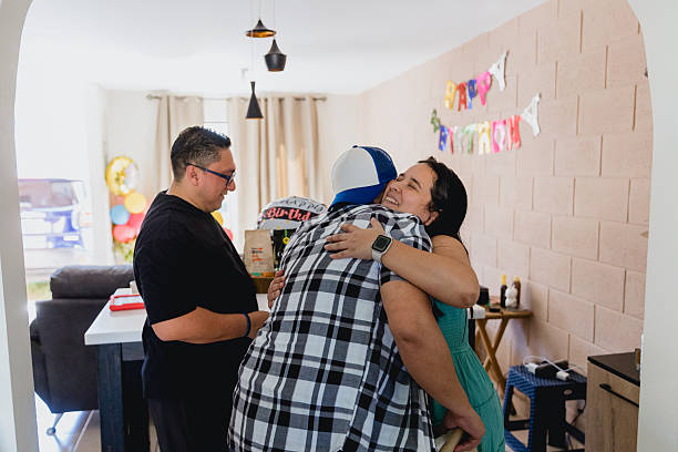 Family Hugging and Embracing In Home