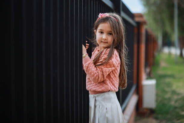 Happy, black kids running in garden and play game together outdoor at home. Children in backyard, excited and race or funny sister chase brother, bonding and laughing for freedom or energy