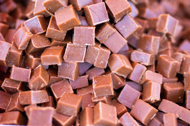 istock Heap of sweet chocolate cubes 2203479248
