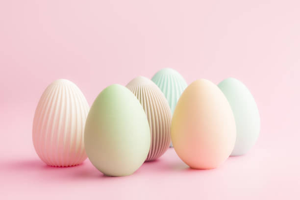 istock Easter decoration. Colorful eggs on pink background. 2203487299