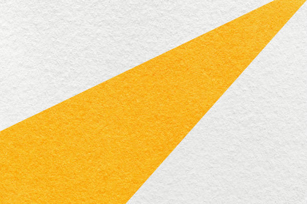 istock Texture old craft white and yellow color paper background, macro. Structure vintage abstract orange cardboard 2203491465