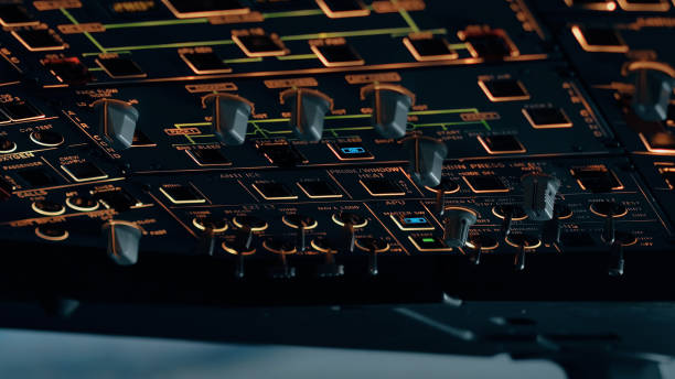 istock Close up of overhead panel of modern aircraft 2203495281