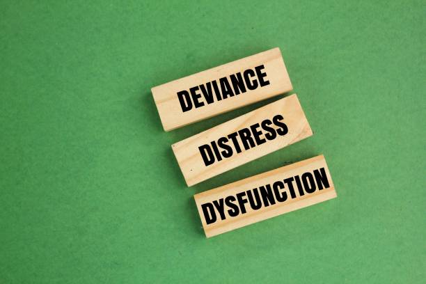 istock wood with the words Dysfunction, distress (or impairment), and deviance. Mental disorders are hard to define 2203500095