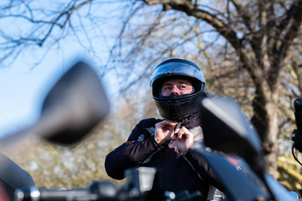 istock Male rider getting ready to get on his motorcycle 2203506957