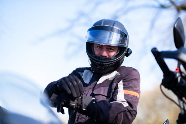 istock Male rider getting ready to get on his motorcycle 2203506992