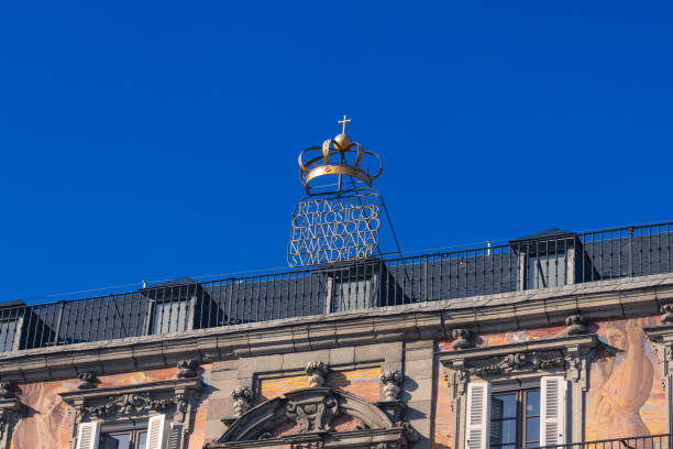Madrid, Spain - October 16, 2024: Detail of the decorations in the pedestal of the statue to Felipe III in Plaza Mayor