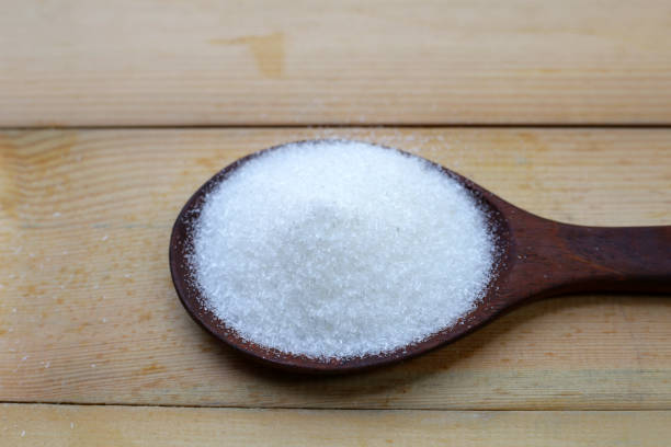 istock Monosodium glutamate in bowl on wooden background. 2203516621