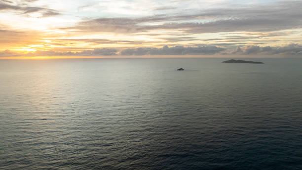istock Ocean view at sunset with distant island. Praslin, Seychelles. 2203517963