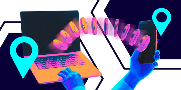 istock Futuristic digital artwork. Coins transferring between laptop and smartphone with location markers, visualizing global transactions. 2203522258