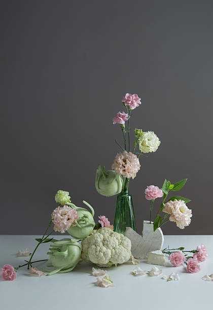 istock unusual composition of flowers, vegetables and cheese 2203522290