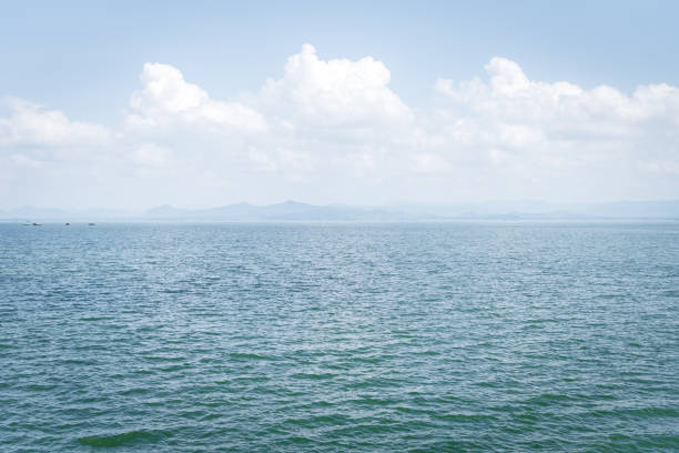 istock Beach and sea with blue sky 2203528119